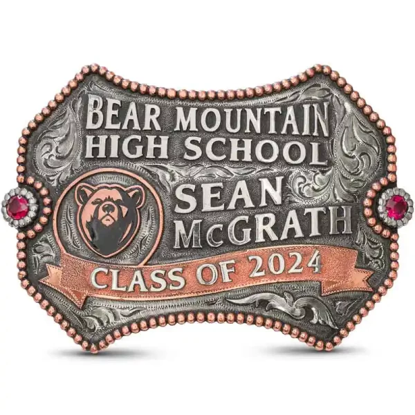 Celebrate your achievements with a touch of classic elegance! The Jacob Belt Buckle features a German Silver base with an antique finish and a distinctive Copper beaded edge with a central banner. Showcase your personalized name and a proud custom logo!